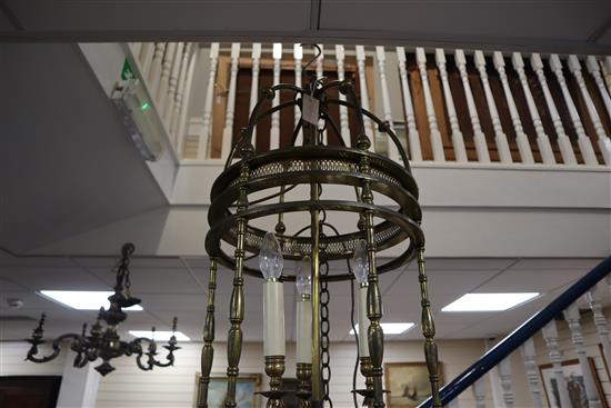 A brass hall lantern of cylindrical form fitted three candle lights, H approx 70cm Dia 37cm